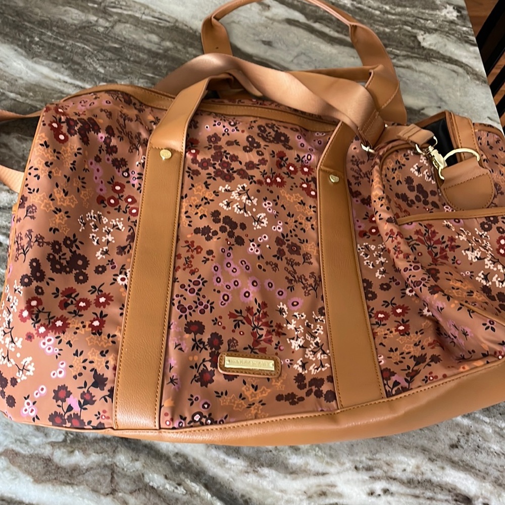 Madden Girl floral duffel bag with shoulder strap